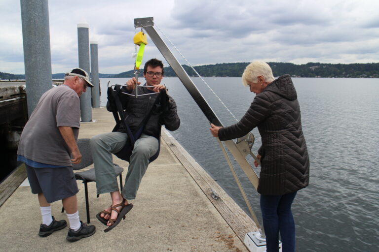 Hoists are used in our adaptive sailing programs to safely transfer individuals from their wheelchairs on the dock to their position on the sailboat.